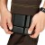 Knee pads with pockets for shock-absorbing liners