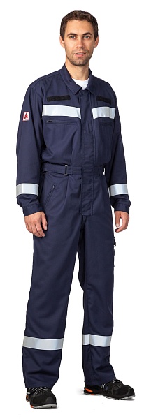 Coverall for oil companies, with storm flap with concealed brass snaps
